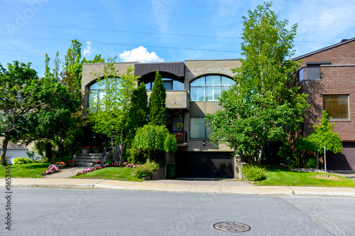 Photography Expensive modern large grey house with huge windows in Montreal, Canada