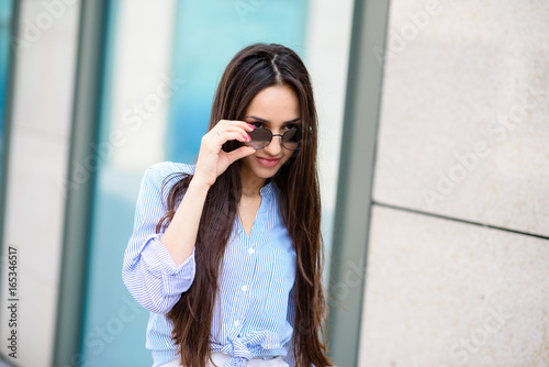 Beautiful girl in sunglasses.