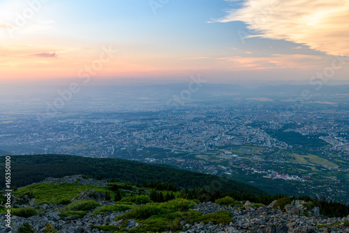 Aerial view to city of Sofia at sunset