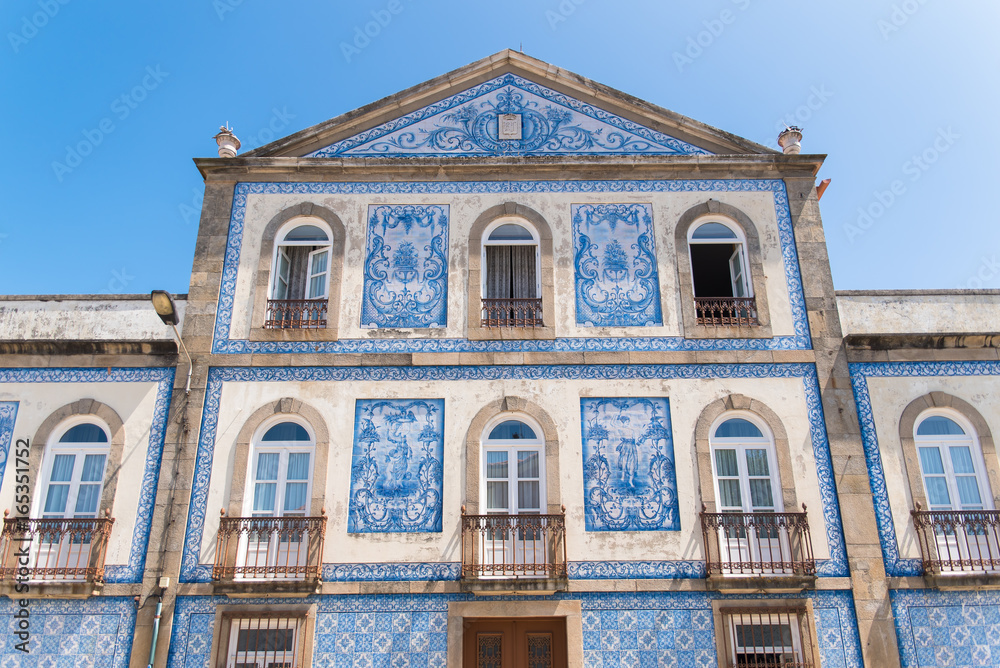 Portugal, typical facade with blue azulejos, beautiful house
