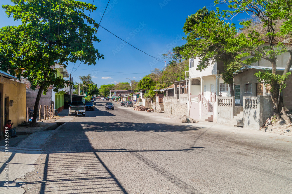 EL POY, EL SALVADOR - APRIL 10, 2016: Road leading to the border between El Salvador and Honduras in El Poy.