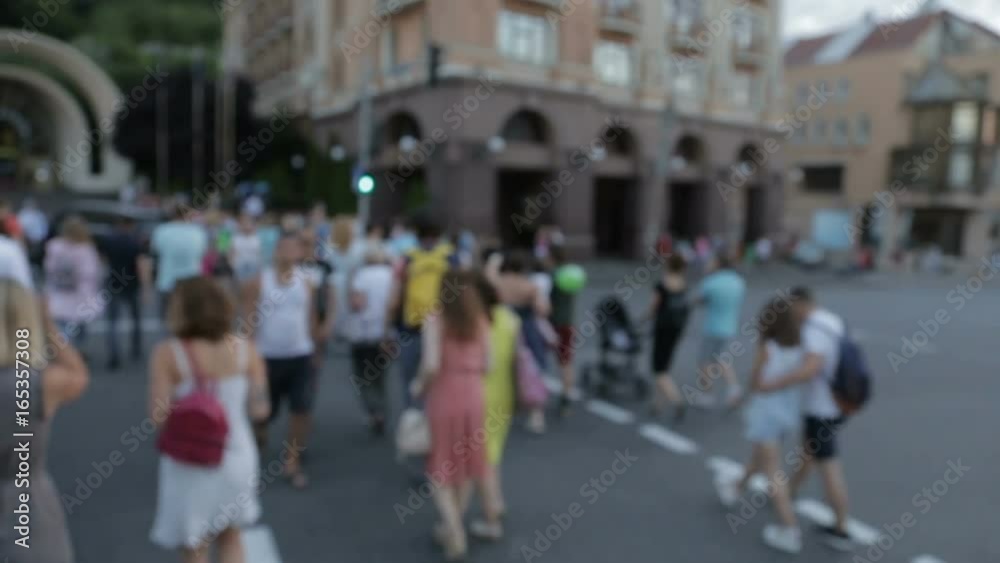 A group of people on a pedestrian crossing A group of people on a pedestrian crossing