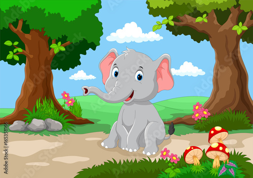 Cute baby elephant with a background of a beautiful garden 