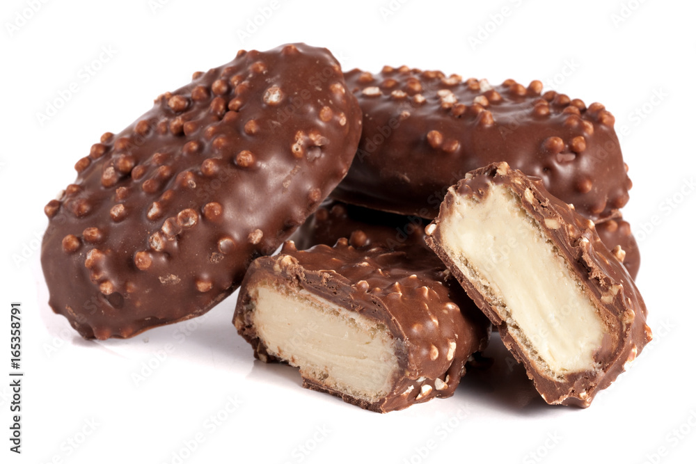 chocolate candy with white cream filling isolated on white background chocolate candy with white cream filling isolated on white background