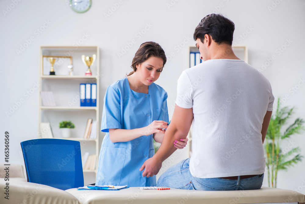 Fototapeta premium Man visiting female doctor in medical concept