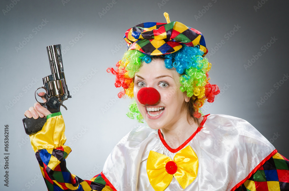 Funny clown in comical concept Funny clown in comical concept