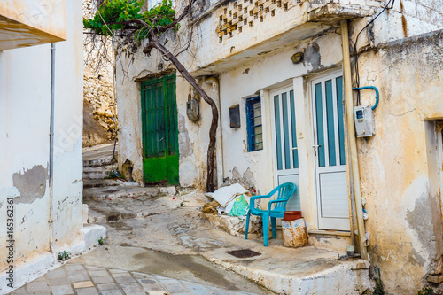 Narrow street in the village of Kritsa near Agios Nikolaos, Crete, Greece © dziewul