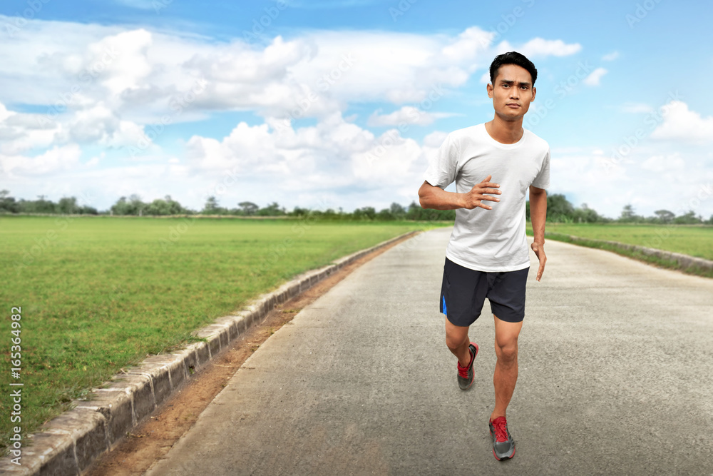 Asian man running