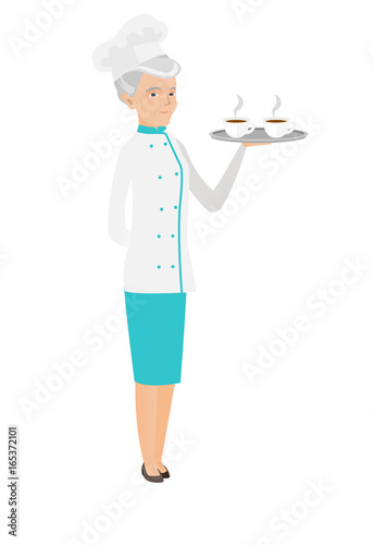 Senior caucasian chef holding tray with cups.