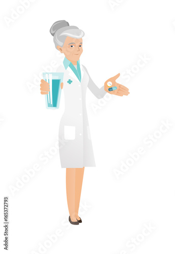 Senior pharmacist giving pills and glass of water.