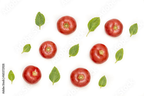 Fototapeta Naklejka Na Ścianę i Meble -  Tomatoes and basil leafs isolated on white background, food pattern