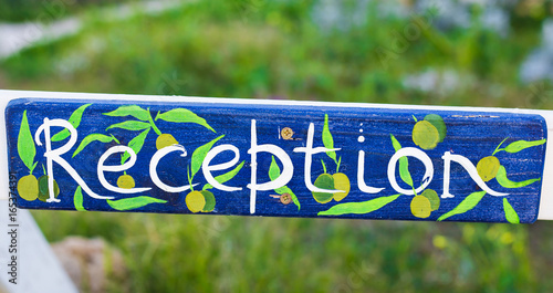 Reception sign at a hotel. photo