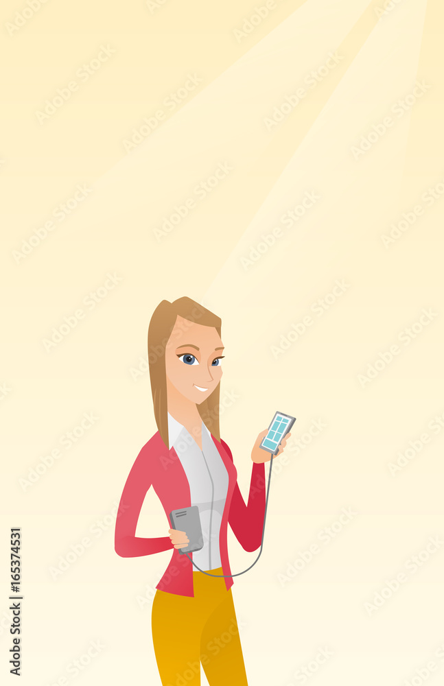 Woman reharging smartphone from portable battery. Woman reharging smartphone from portable battery.