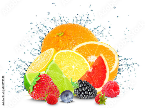 Citrus and berries water splash isolated