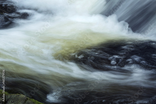 Fototapeta Naklejka Na Ścianę i Meble -  Rushing water at base of Carpenter's Falls in Granby, Connecticut.