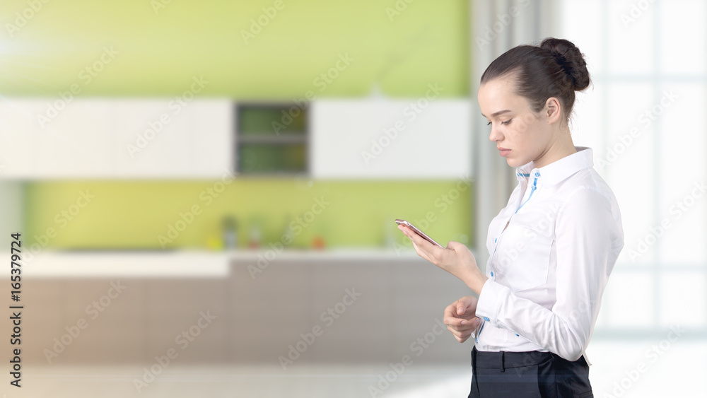 Young beautiful business woman and creative designer standing over blured interior background Young beautiful business woman and creative designer standing over blured interior background