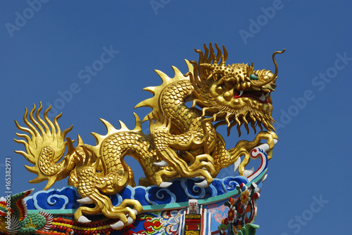 Wallpaper Mural Chinese dragon in front of blue sky Torontodigital.ca