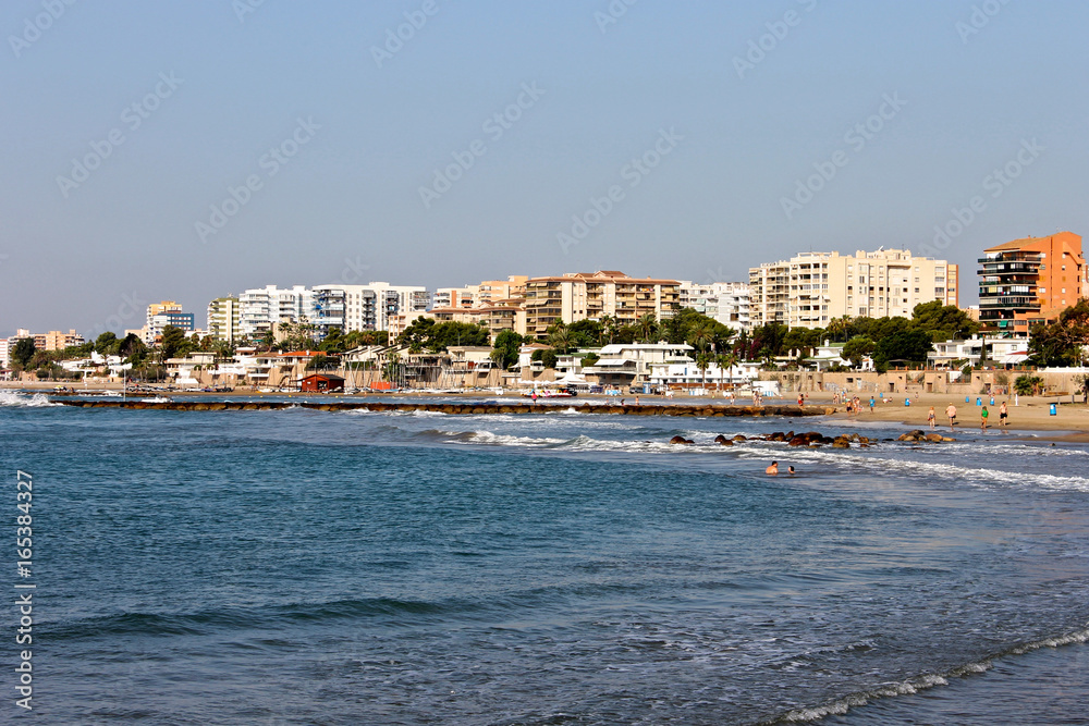 The Torreon Beach in Benicassim, a beach resort in the Costa del Azahar coast, province of Castello, Spain The Torreon Beach in Benicassim, a beach resort in the Costa del Azahar coast, province of Castello, Spain