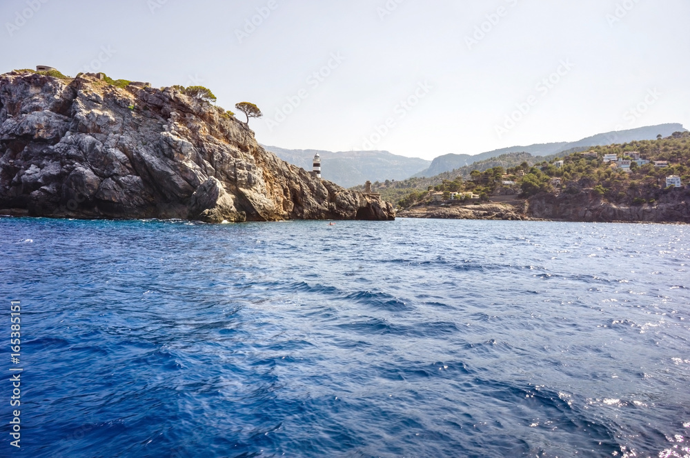 Beautiful view of coastline with lighthouse near Port de Soller in Mallorca, Spain