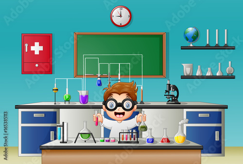 Scientist boy in laboratory research with chemical glassware