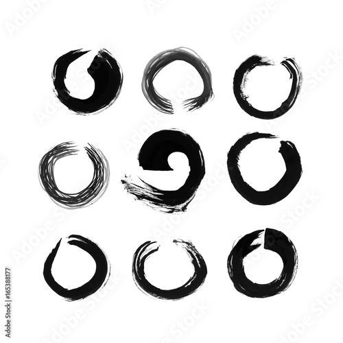 Hand drawn signs enso created by dry brush. Grunge style set on the white background.
