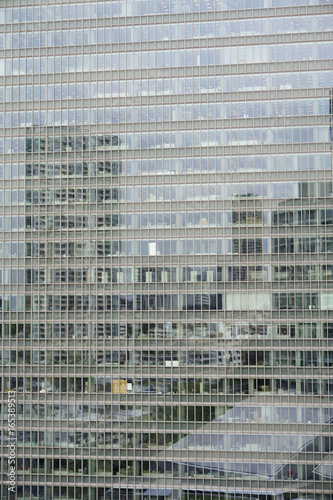 Full frame shot of modern office building with reflection photo