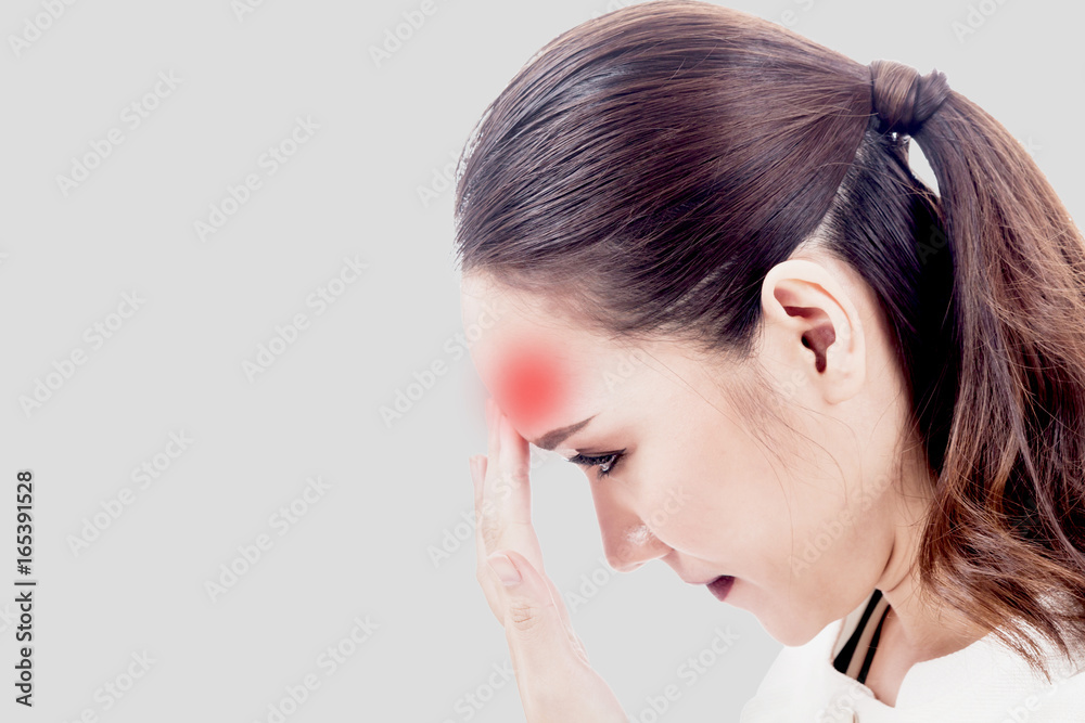 Woman headache and holding head on gray background Woman headache and holding head on gray background