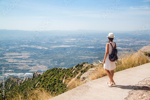 Photography Young woman enjoying the view in Montserrat mountains
