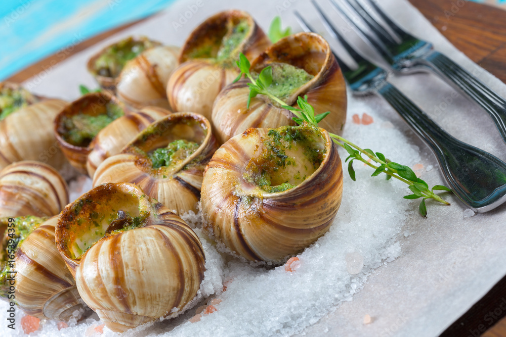 Baked snails with garlic butter and fresh herbs Baked snails with garlic butter and fresh herbs
