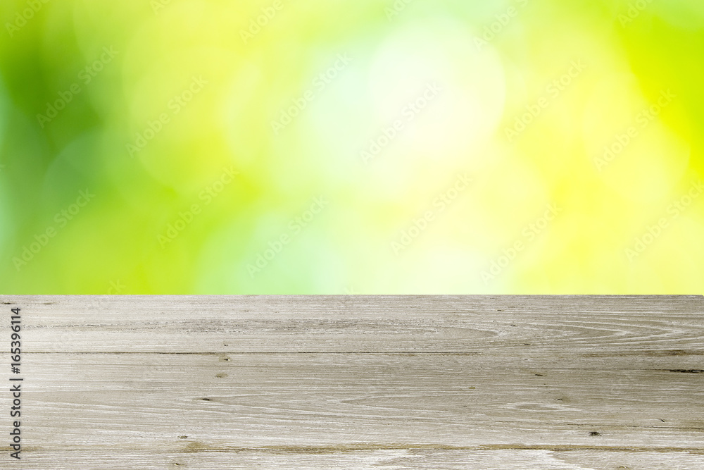 Empty top wooden table and sunny abstract blurred bokeh background Empty top wooden table and sunny abstract blurred bokeh background