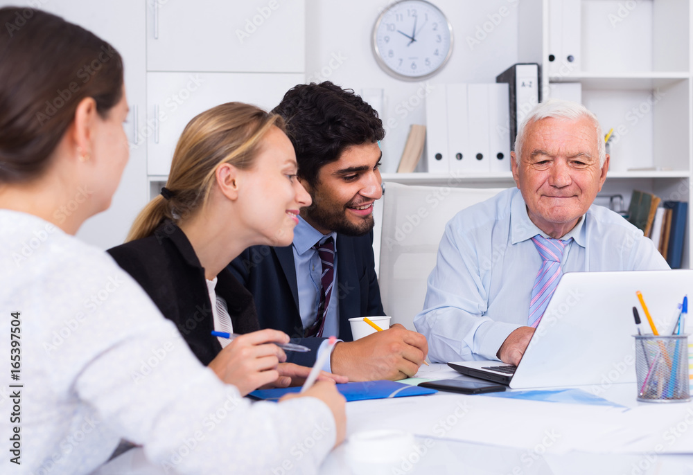 Fototapeta premium Office workers are working together at computer