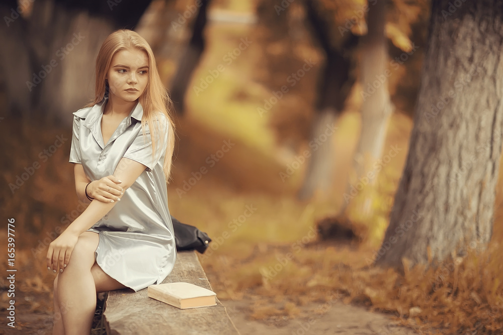 Young girl in autumn portrait, blond adult Young girl in autumn portrait, blond adult