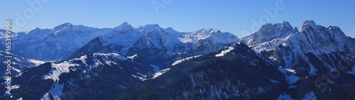 Stunning view from mount Rellerli, Switzerland. High mountain Oldenhorn and other peaks. Winter landscape.