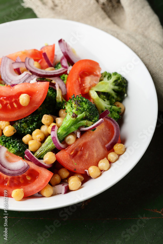 Healthy salad with broccoli and tomato