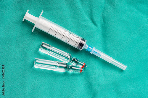 Medical syringe and vials