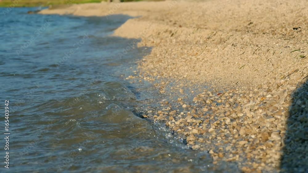 sea waves splashing sandy shore at sunset in slow motion hd sea waves splashing sandy shore at sunset in slow motion hd