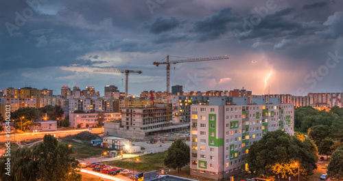 Photography Lightning Over Housing Estate. Storm in the City.