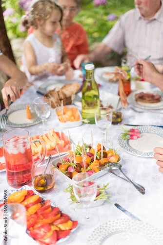 Lunch in the garden for multi-generation family
