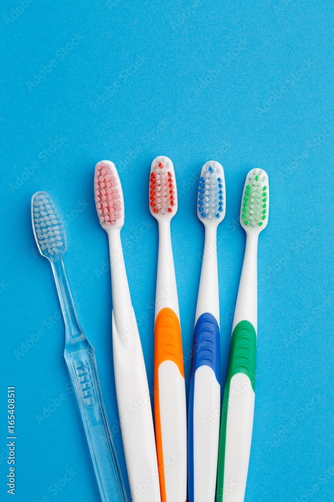 Photo of five colored toothbrush Photo of five colored toothbrush