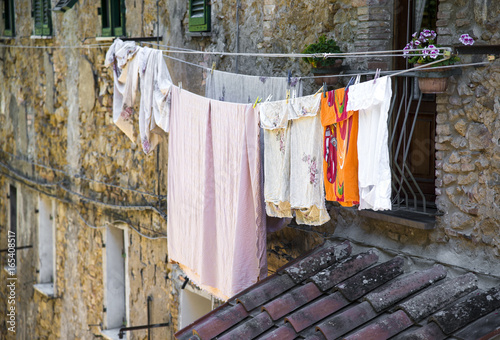 Laundry hanging out of a typical Italian facade