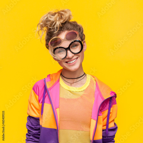 Girl in flip glasses with hair bun