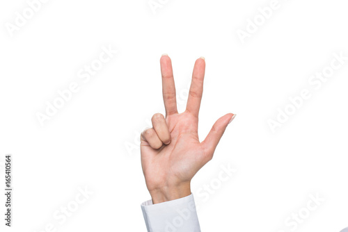 cropped view of person gesturing signed language or showing three sign, isolated on white