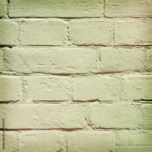 brick wall covered with  yellow lime