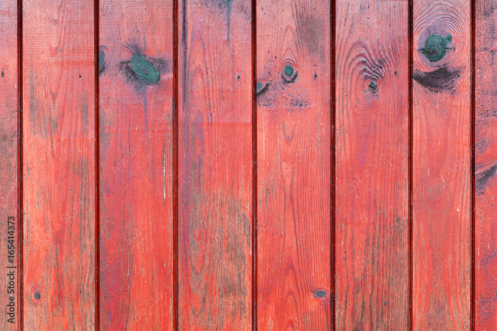 The old red wood texture with natural patterns The old red wood texture with natural patterns