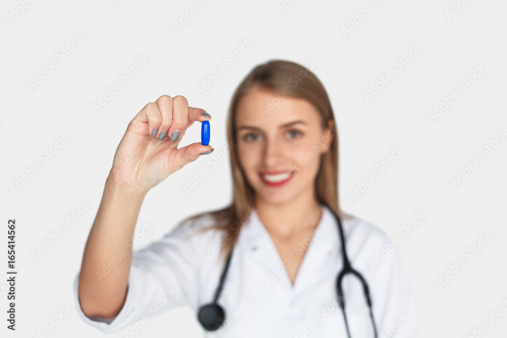 Doctor holding pill Doctor holding pill