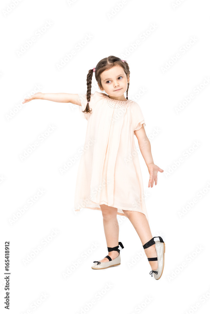 little adorable girl in beautiful dress with braids presenting something, isolated on white little adorable girl in beautiful dress with braids presenting something, isolated on white
