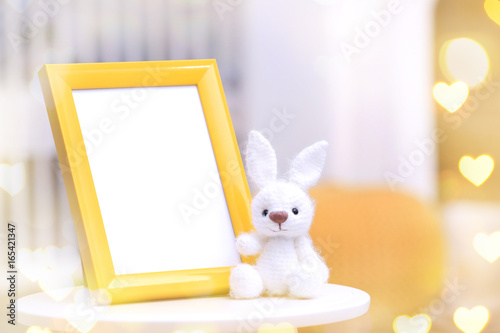 Empty photo frame with toy ...