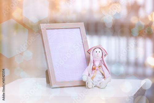 Empty photo frame with toy ...