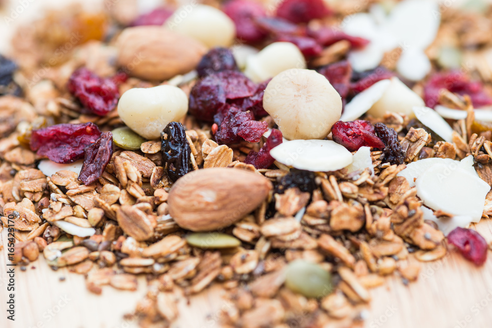 Closed up and blur breakfast healthy food, granola, musli, Organic oat, super food with honey, dried fruits and nuts