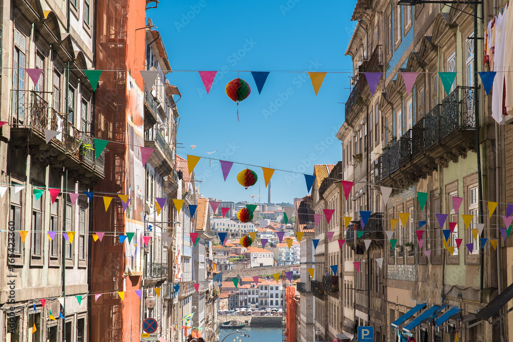 Porto, Portugal, street with decorations, view of the river
